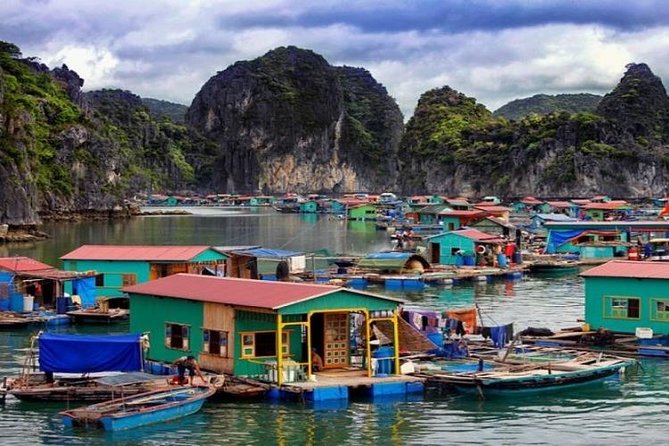 1 Day Boat Tour: HaLong Bay, Lan Ha Bay, Natural Beach and Full Moon Party - Stop 2: Kayaking the Bright Cave and Dark Cave lagoons