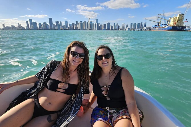 2 hrs Miami Private Boat Tour with Cooler, Ice, Bluetooth Stereo - Entering Miami’s skyline from the water, after dark