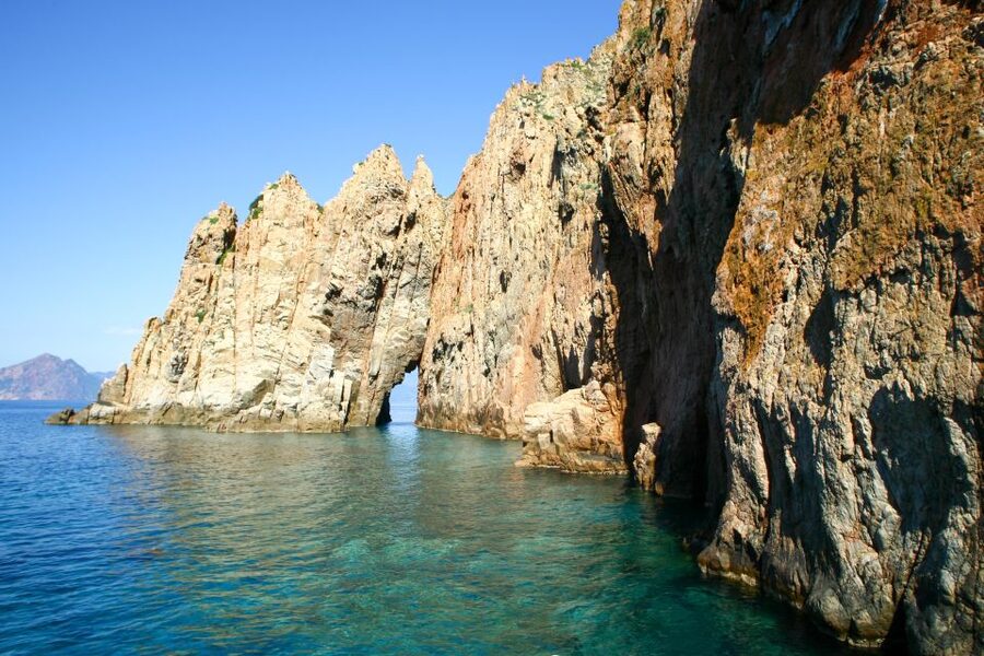 Ajaccio/Porticcio: Scandola Nature Reserve Guided Boat Tour - Calanques de Piana: red granite cliffs close enough to feel big