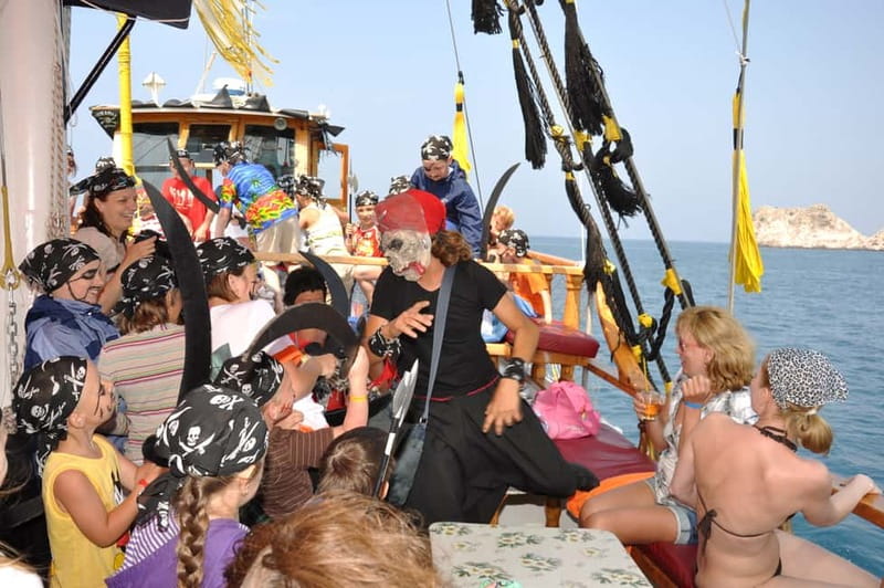 Alanya: Pirate Boat Trip with Meal, Drinks and Pickup Option - Caves and coastline stops: Bosphorus, Lovers’, and Maiden