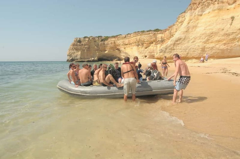 Albufeira: 6-Hour Boat Tour with BBQ and Drinks - From main boat to dinghies: the beach BBQ transfer
