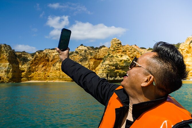 Algarve Private Tour from Lisbon with Benagil Caves Boat Trip - Benagil boat trip: close caves, possible spray, and dolphins that are not guaranteed