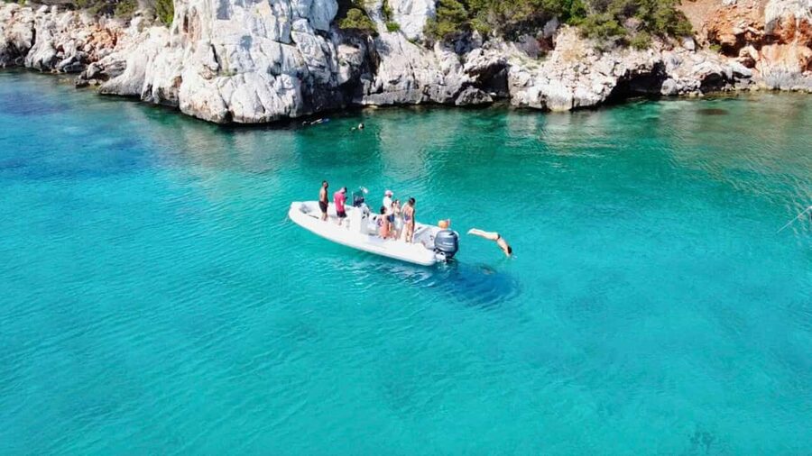 Alghero: Boat Tour with Snorkeling in Porto Conte - Stop 1: Cala Dragunara swimming pools and what to expect in the water