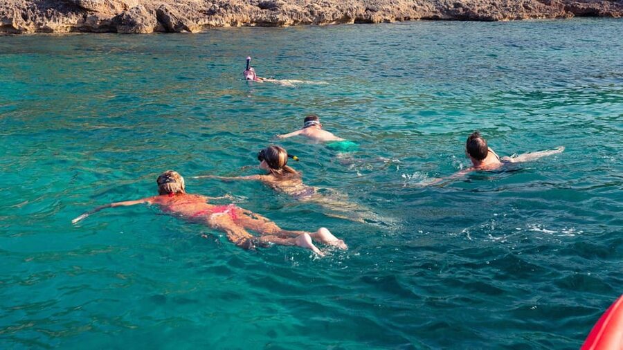 Alghero: Snorkeling Boat Tour in Porto Conte and Capo Caccia - Capo Caccia cliffs and sea caves: the big scenery payoff