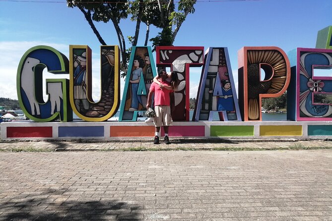 Amazing Private Guatape Tour + Boat Ride + Helicopter & Rock - The Colorful Plaza Moment in Guatapé