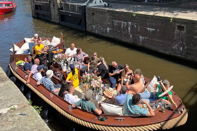 Amsterdam Luxury Boutique Boat tour with Unlimited Beer and Wine - Oude Kerk views: Amsterdam’s oldest parish church in real use