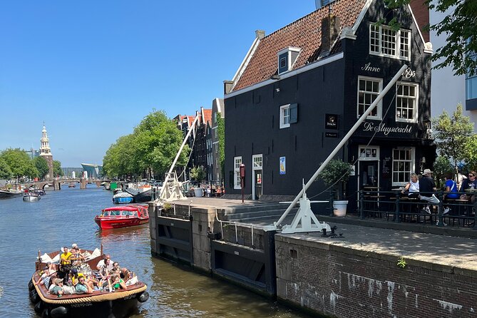 Amsterdam Luxury Boutique Boat tour with Unlimited Beer and Wine - Unlimited beer and wine: included basics, extra upgrades