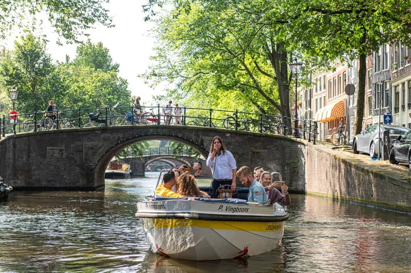 Amsterdam: Open Boat Tour of Canals with Expert Local Guide - Key highlights worth aiming for