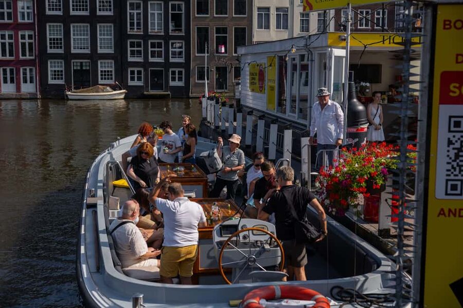 Amsterdam: Open Boat Tour of Canals with Expert Local Guide - Smaller Canals Make the Tour Feel Personal (Not Like a Float on Rails)