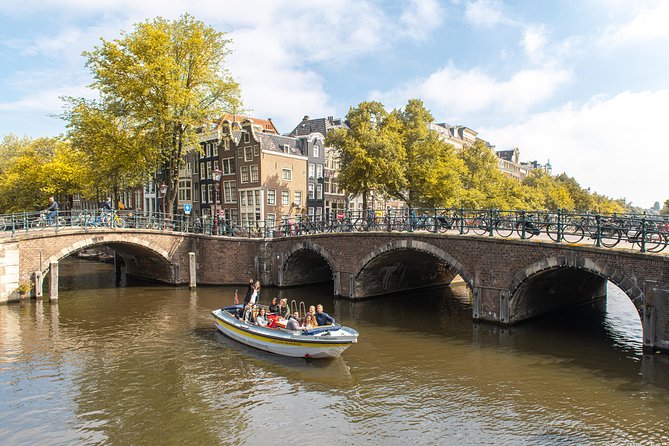 Amsterdam Open Boat Tour with Local Guide - Bridge of Love: The Canal Moment You’ll Actually Remember
