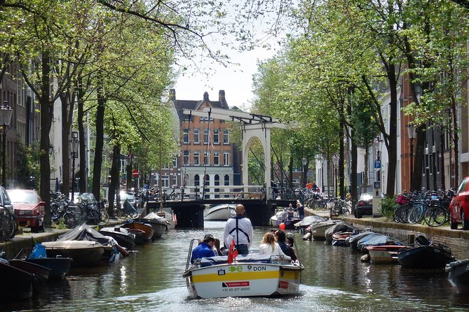 Amsterdam Open Boat Tour with Local Guide - Getting the Most From Your Departure: Times, Tickets, and Nearby Transit