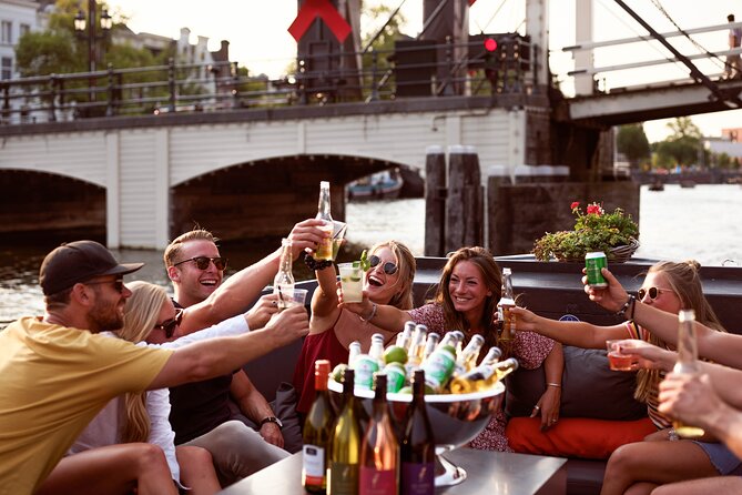 Amsterdam Private Boat Tour with Unlimited Drinks - A science stop on a green ship-like building