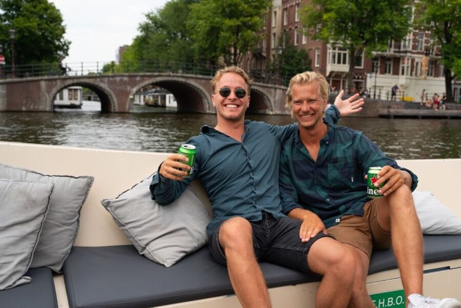 Amsterdam: Red-Light District Pub Crawl and Booze Boat Tour - Transition Night: Meeting Again at The Black Tiger Bar