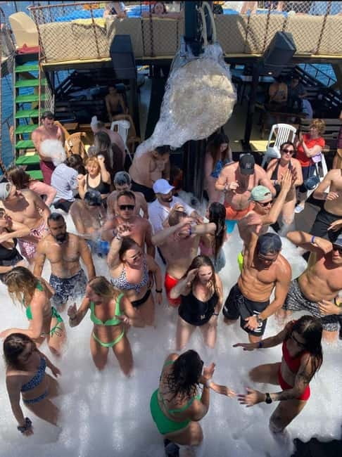 Antalya/Kemer: Boat Tour Visit Caves and Bays With Lunch - Onboard Vibe: Lunch, Guide Help, and the Foam Party Energy