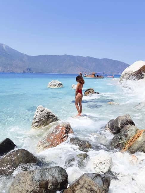 Antalya: Suluada Island Boat Trip with Lunch & Hotel Pickup - Suluada Island swim break: white sand, clear bays, and rocky edges