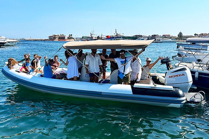 Avola: Vendicari Capopassero Group Boat Tour and Aperitif - The aperitif stop: Sicilian sparkling wine and arancini on the water