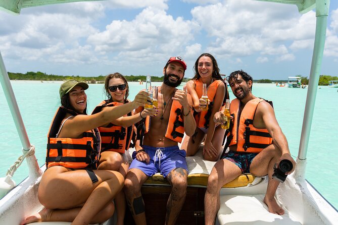Bacalar Boat Tour and Visit to Cenotes - Onboard value: fruit drinks, snacks, and 3 beers per adult