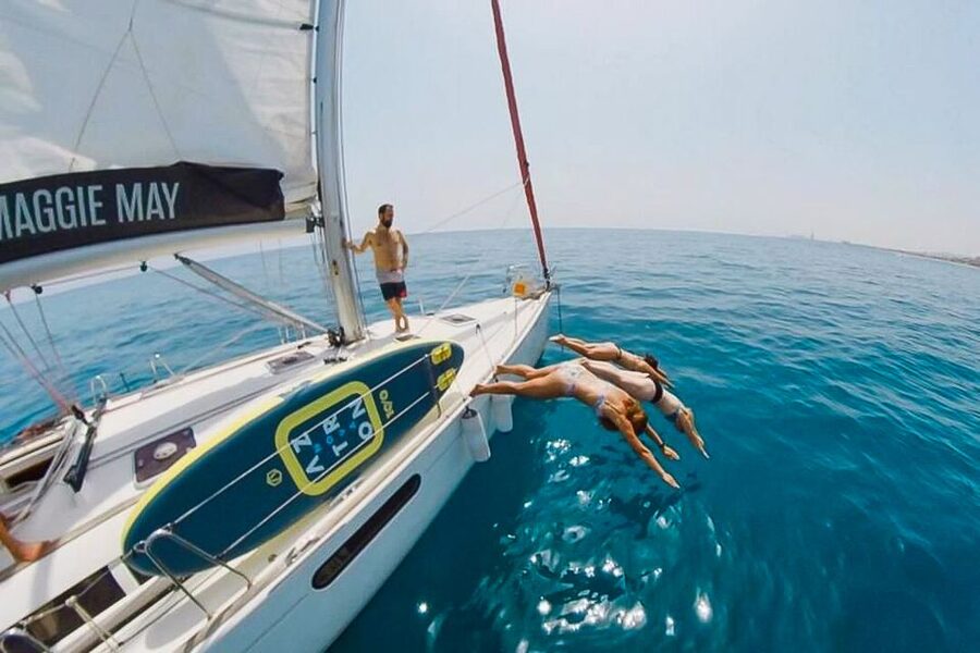 Barcelona: Coastline Boat Trip with Snacks and Cava - Swim stop in clear Mediterranean water (and what to do if it’s not perfect)