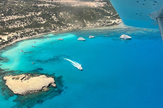 Blue Lagoon Latchi Pafos, boat trip with water slide F/D - Baths of Aphrodite: Photos First, Swimming Not the Point