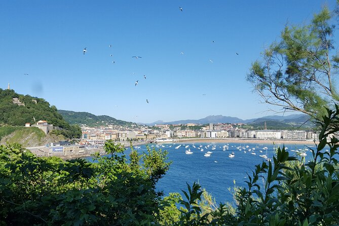 Boat by the Bay and Santa Clara Island in Donostia San Sebastian - Hondalea at the House of the Lighthouse (Cristina Iglesias)