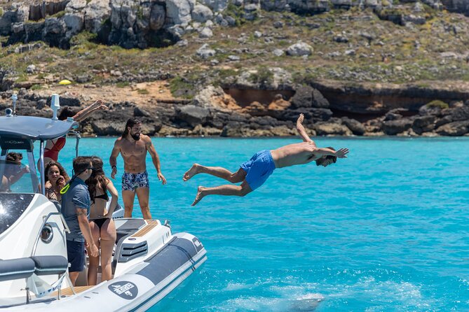 Boat Tour Egadi Day discover Favignana and Levanzo from Trapani - Drinks, restroom, and practical comfort on a full 8 hours
