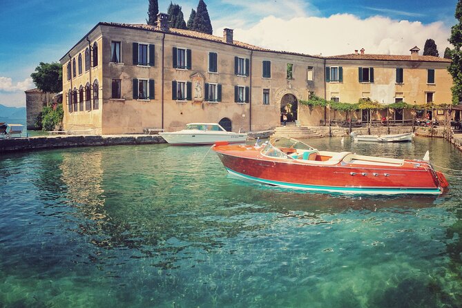 Boat Tour of Isola del Garda - Grotte di Catullo from the Water: Ruins Framed by Lake Garda