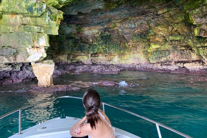 Boat tour of the Polignano a Mare caves with aperitif - Cala Paura and Grottone: Torno Subito and a Sea-Door Cinema