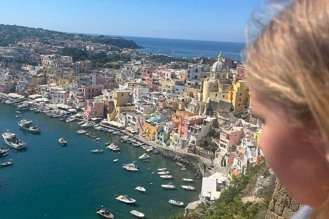 Boat tour with lunch on board to discover Procida - Lacco Ameno and San Montano: Bruschetta, Local Wine, and a First Swim