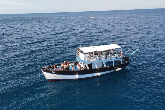 Boat tour with lunch on board to discover Procida - Postino Beach From the Water: A Famous Bay Moment