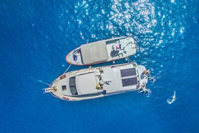 Boat Trip in Crete with Guided Snorkeling and Free Pick up! - Akrotiri Peninsula cruise: bays, shallow water, and the Blue Cave glow