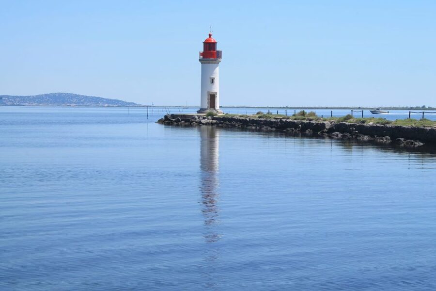Boat trip in the canals is on the Thau pond - Sète’s canals: colorful facades and historic corners, seen at water level