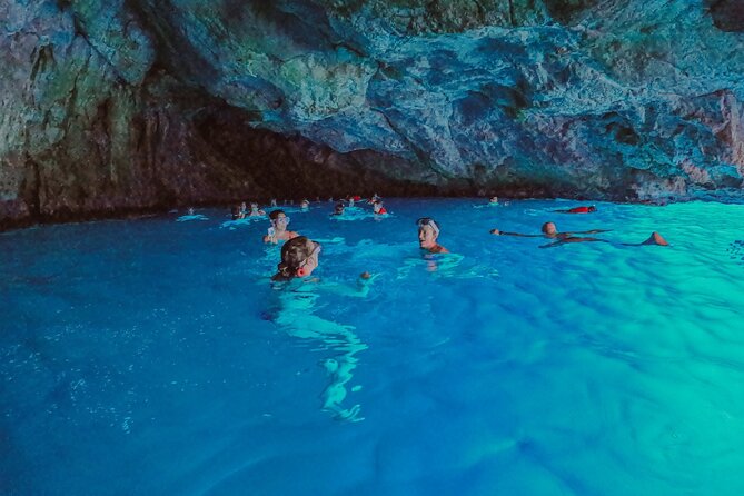 Boat Trip to Llevant Natural Park and Blue Cave - Es Caló port time: paddling, snorkeling, and a quick taste of local seafront life