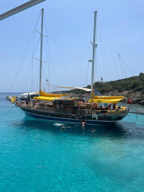 Bodrum: Orak Island Boat Trip with Lunch & Optional Transfer - German Bay Swim Stop: Swimming, Jumping Off, and Snorkeling Reality