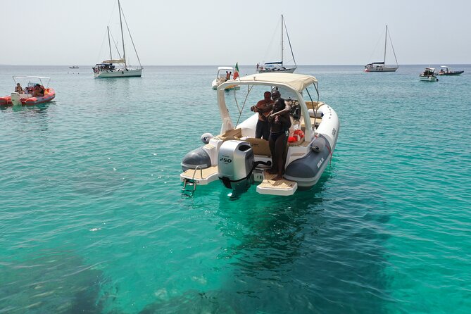 Cagliari Boat Tour 4 Stops .Possible Sighting of Dolphins - Stop 1 Cala Bernat and the Santa Elia backup if seas turn