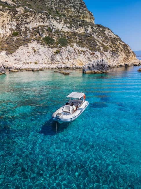 Cagliari: Boat Tour, Snorkeling, Prosecco & Music! - The coastline views: Sella del Diavolo and city perspectives