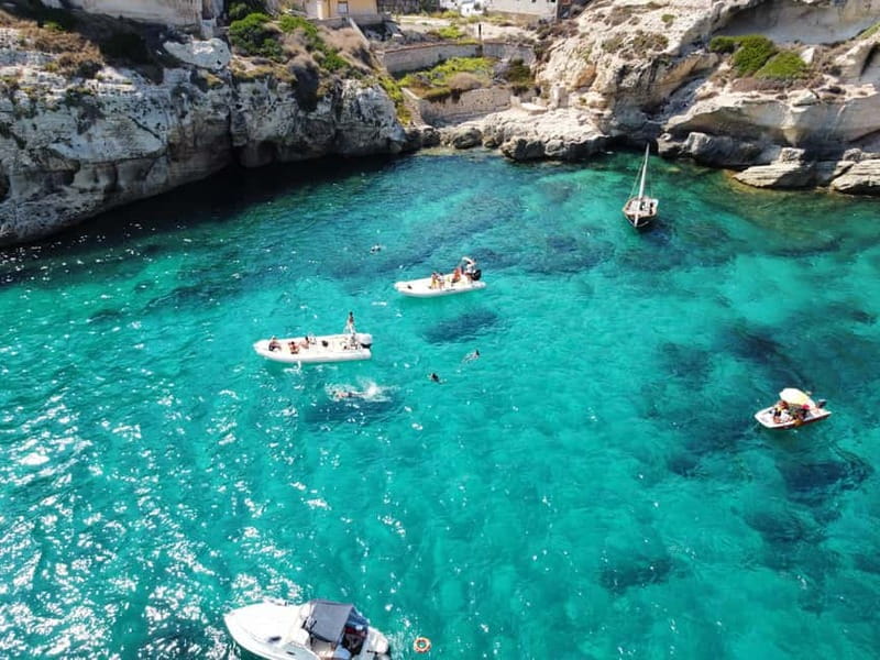 Cagliari: Boat Tour with 4 Swim Stops, Snorkeling & Prosecco - Grotta dei colombi: a quick pass-by
