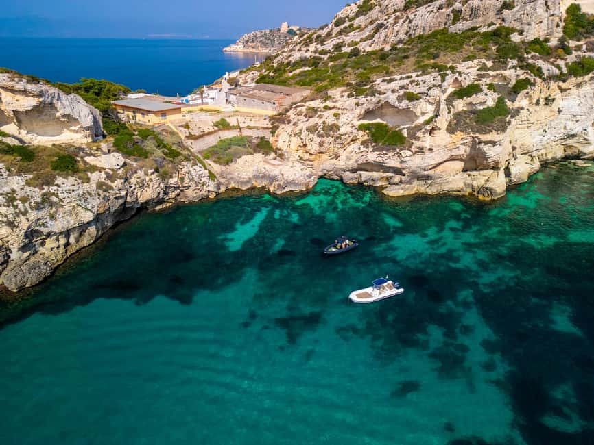Cagliari: Boat Tour with 5 Snorkeling Stops & Free Drinks - Cala Mosca: your first taste of clear water near Cagliari