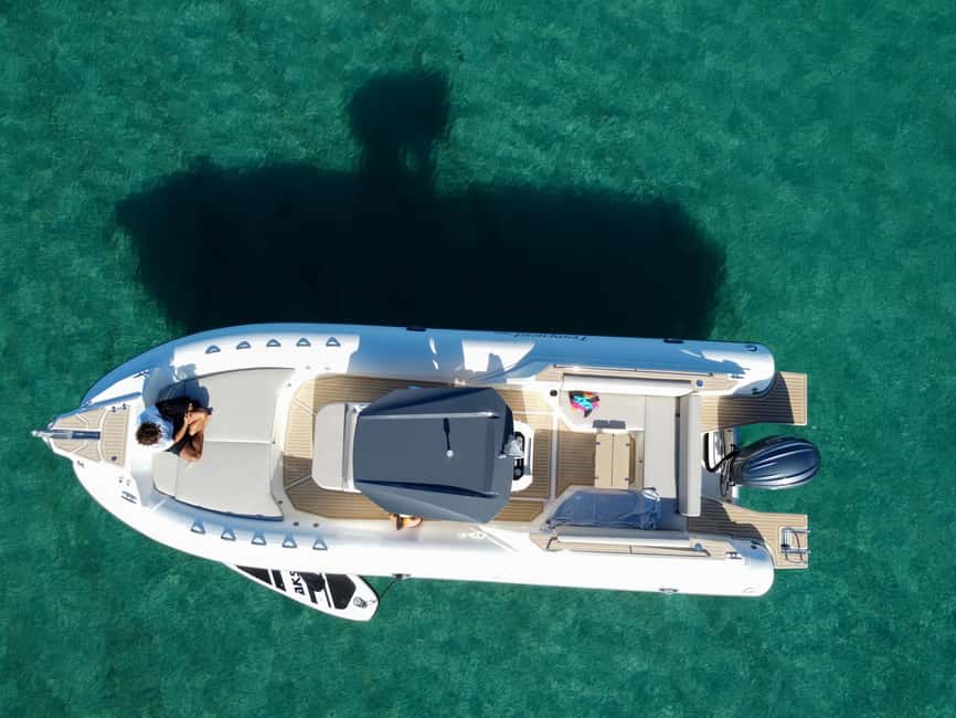 Cagliari: Boat Tour with 5 Snorkeling Stops & Free Drinks - Poetto: a quick sprint for swimmers, with wind as the wildcard