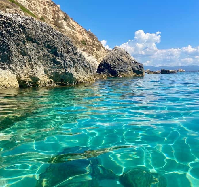 Cagliari: Boat Tour with Snorkeling, GoPro & Sardinian Beer - Where You Meet and How the Day Flows