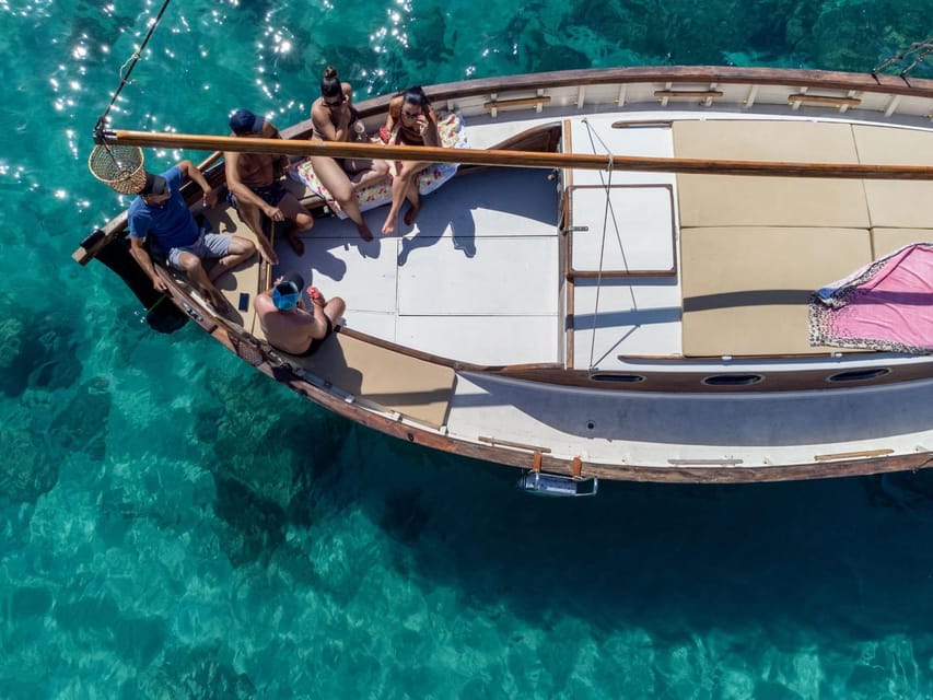 Cagliari: Classic Boat tour along the gulf with tasting. - Crew Energy: Andrea and the On-Board Style That Keeps It Relaxed