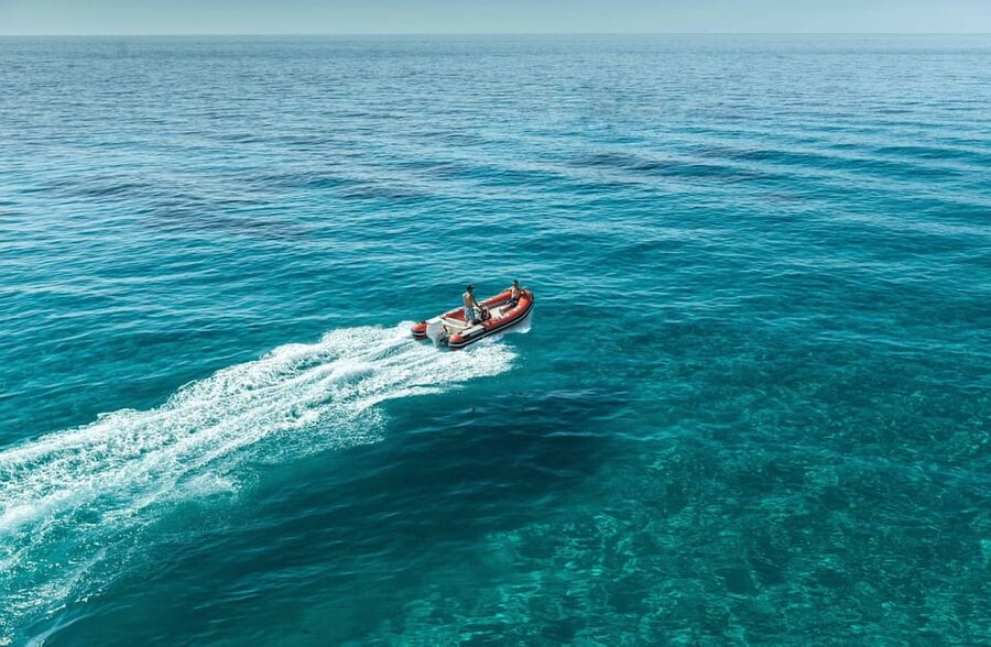 Cagliari: Devil's Saddle Boat Tour with Spritz and Chips - Cala Fighera Photo Stops and the Nudist-Friendly Reality Check