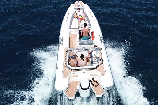 Cagliari Luxury Boat Tour: 3h Premium Snorkeling on New 8m Boat - Calamosca Beach: Turquoise Water and a Softer Pace