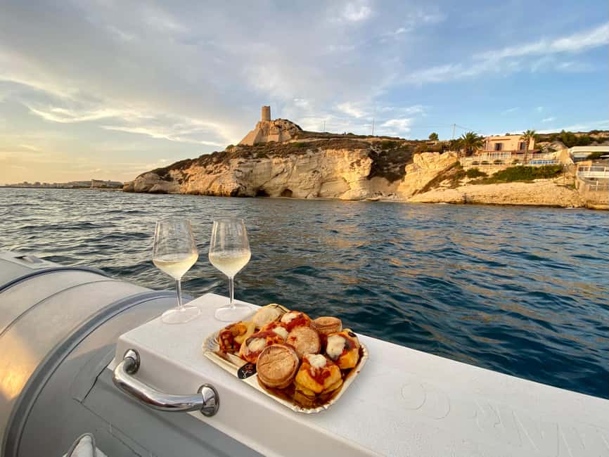 Cagliari: Sunset Boat Tour with Aperitif and Prosecco - Cala Mosca at sunset: Prosecco, snacks, and background music