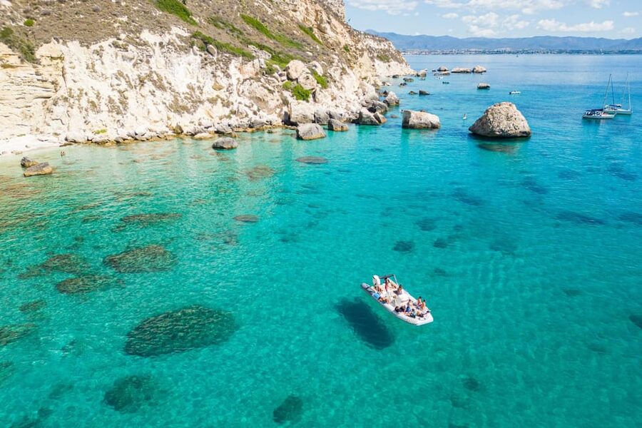 Cagliari: Zodiac Boat Tour, 3-4 SwimStops, Wine & Snorkeling - Morning vs afternoon: how sea conditions can change your experience