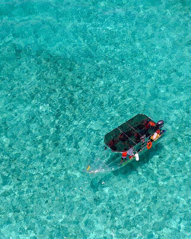 Cancún: Nichupté Lagoon Transparent Boat Tour with Drinks - First 25 Minutes: The Guided Cruise Through the Lagoon