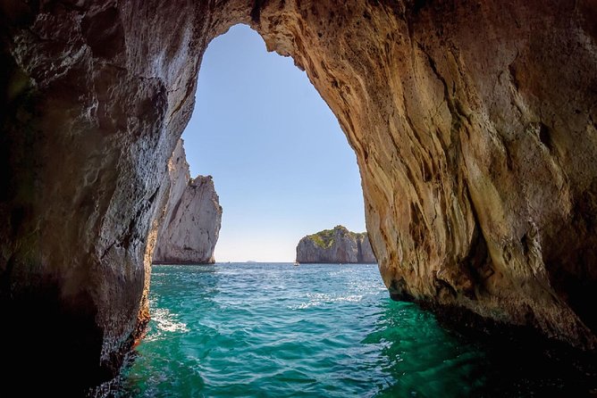 Capri Boat Tour from Sorrento: Swim, Grottos & Light Lunch - White Grotto and Green Grotto: Two Stops, Two Different Light Shows