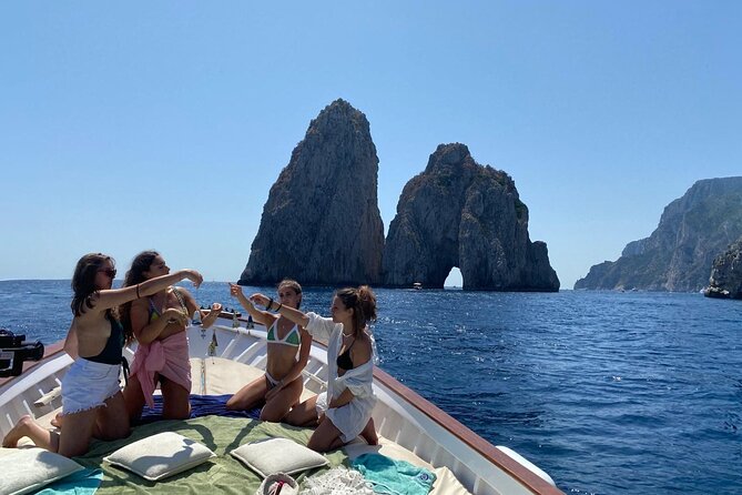 Capri Boat Tour: Grottoes, Swim & Sip Limoncello in a Small Group - Faraglioni, Punta Carena, and Malaparte’s Villa: The Landmarks That Pop From Sea Level