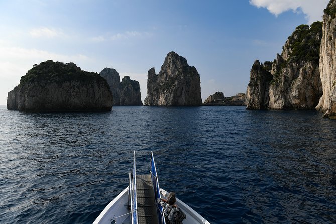 Capri Coast to Coast: Boat Tour with Optional Blue Grotto - Capri from the water: how the Marina Grande boat loop really works