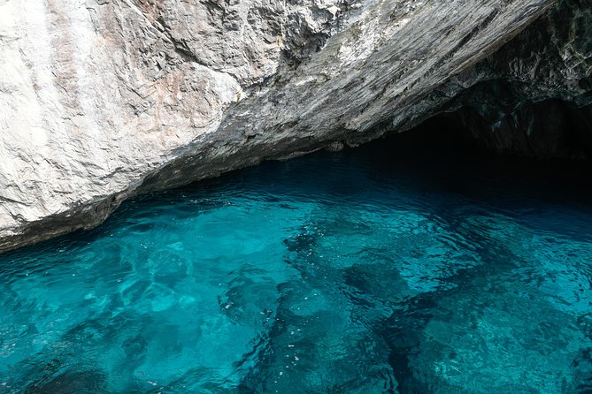 Capri Coast to Coast: Boat Tour with Optional Blue Grotto - The grotto route: Marvellous, White, Green, and the Blue Grotto gamble