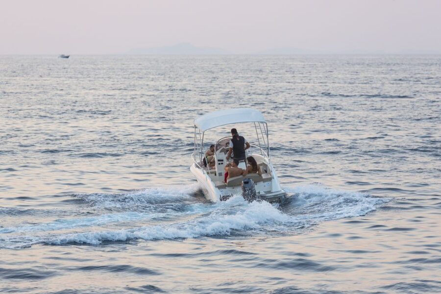Capri Island & Blue Cave Private Boat Tour from Sorrento - Capri’s Cliffside in Full View: Grottos and the Faraglioni